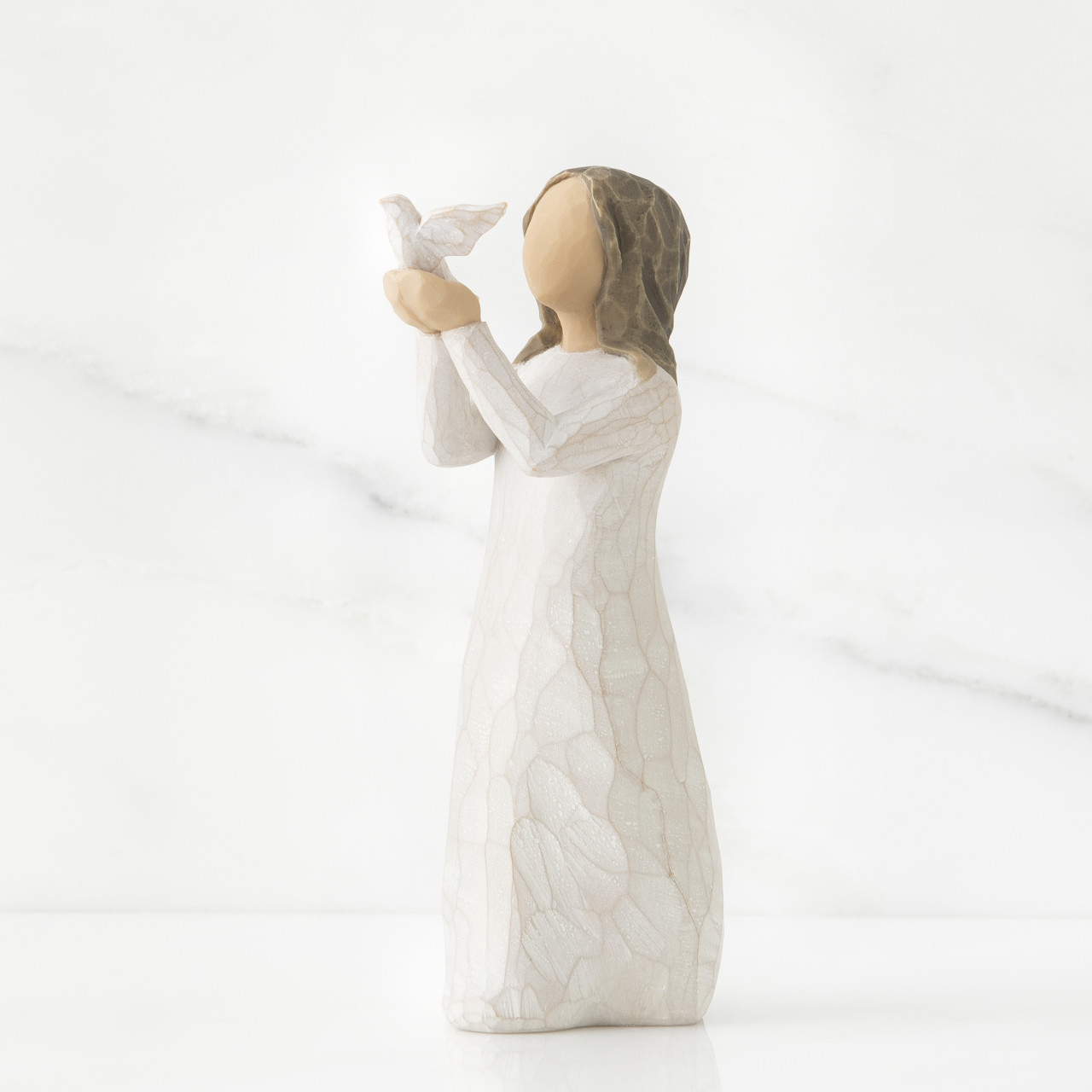 Soar sculpted figure by Susan Lordi