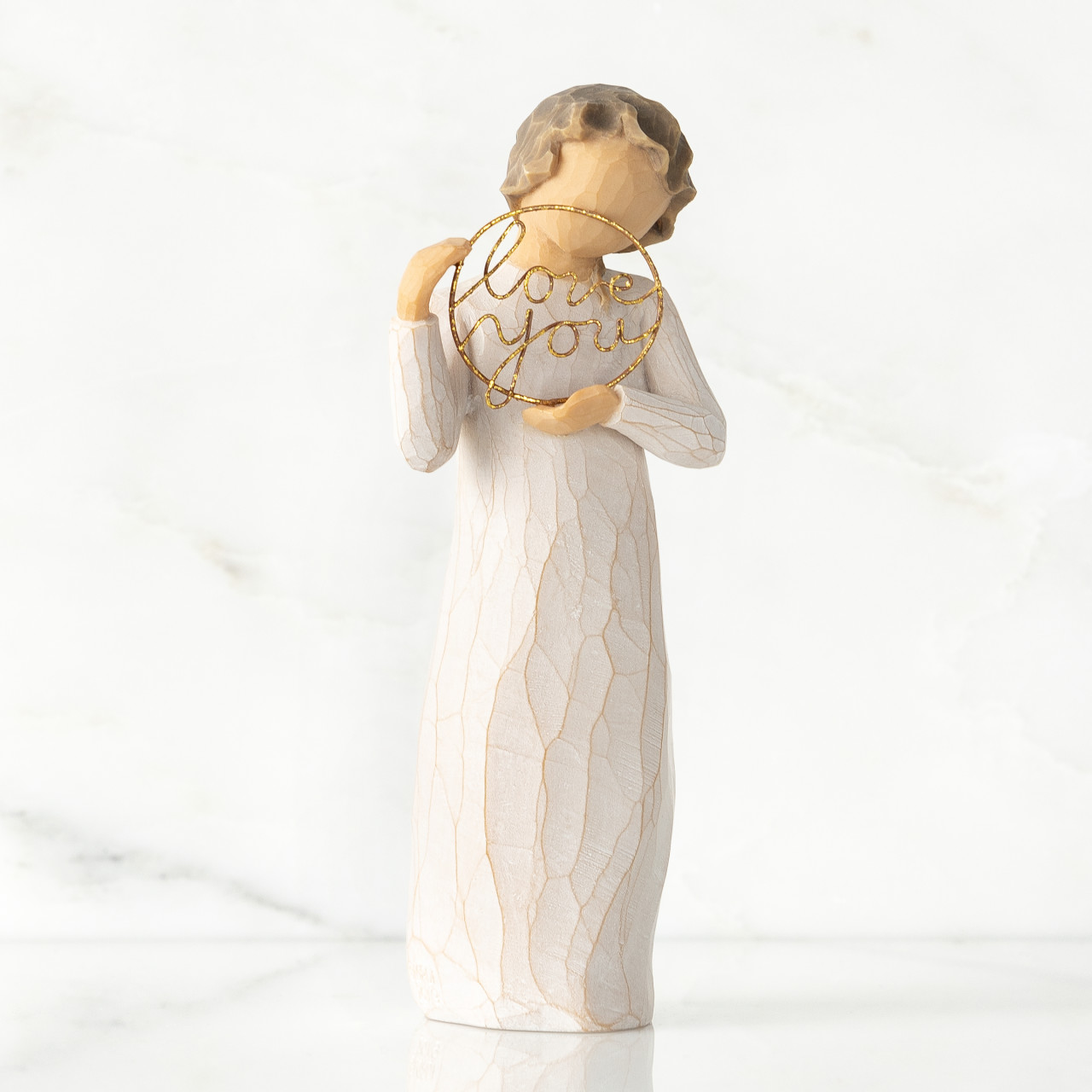 Love you sculpted figure by Susan Lordi