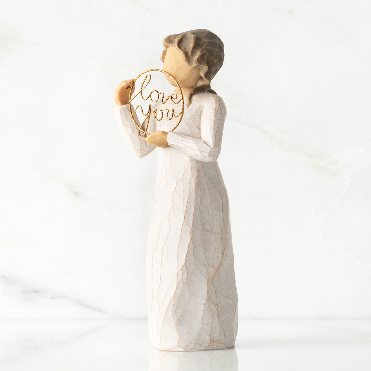 Love you sculpted figure by Susan Lordi