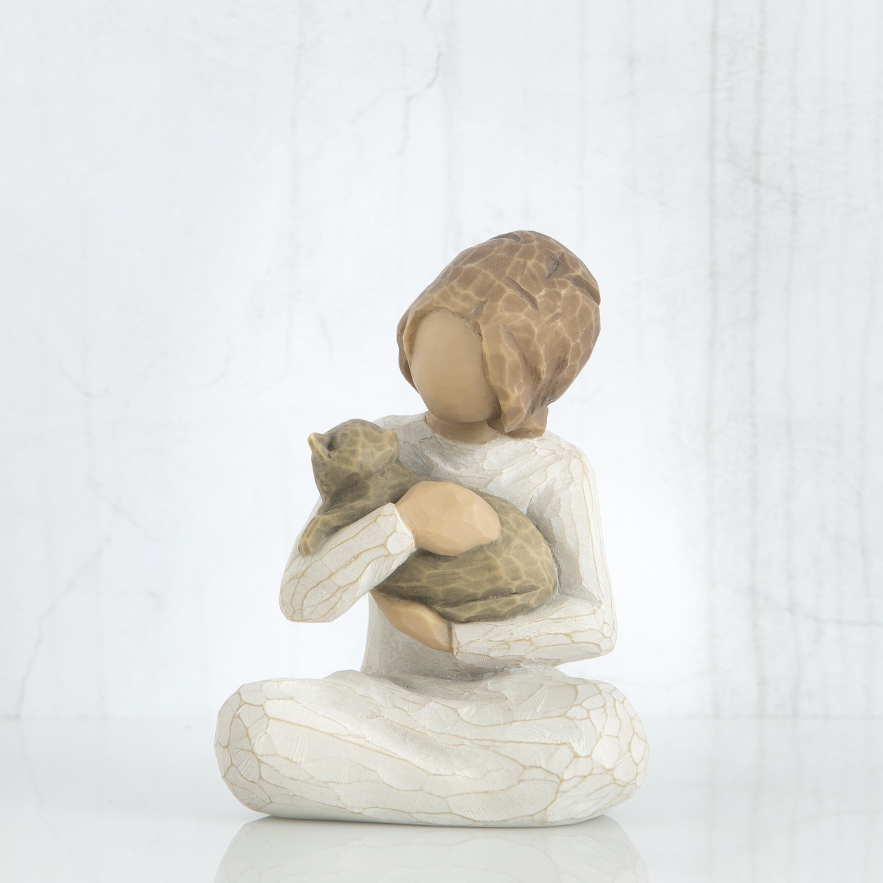 Kindness (girl) sculpted figure by Susan Lordi