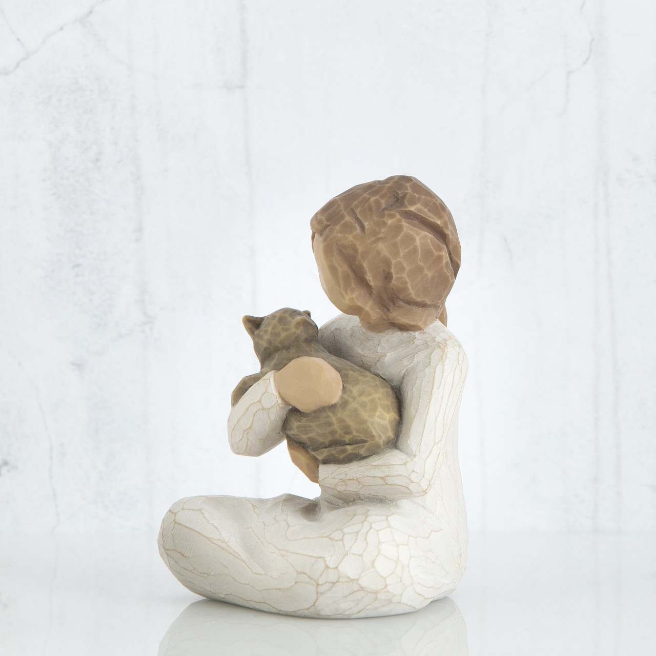 Kindness (girl) sculpted figure by Susan Lordi
