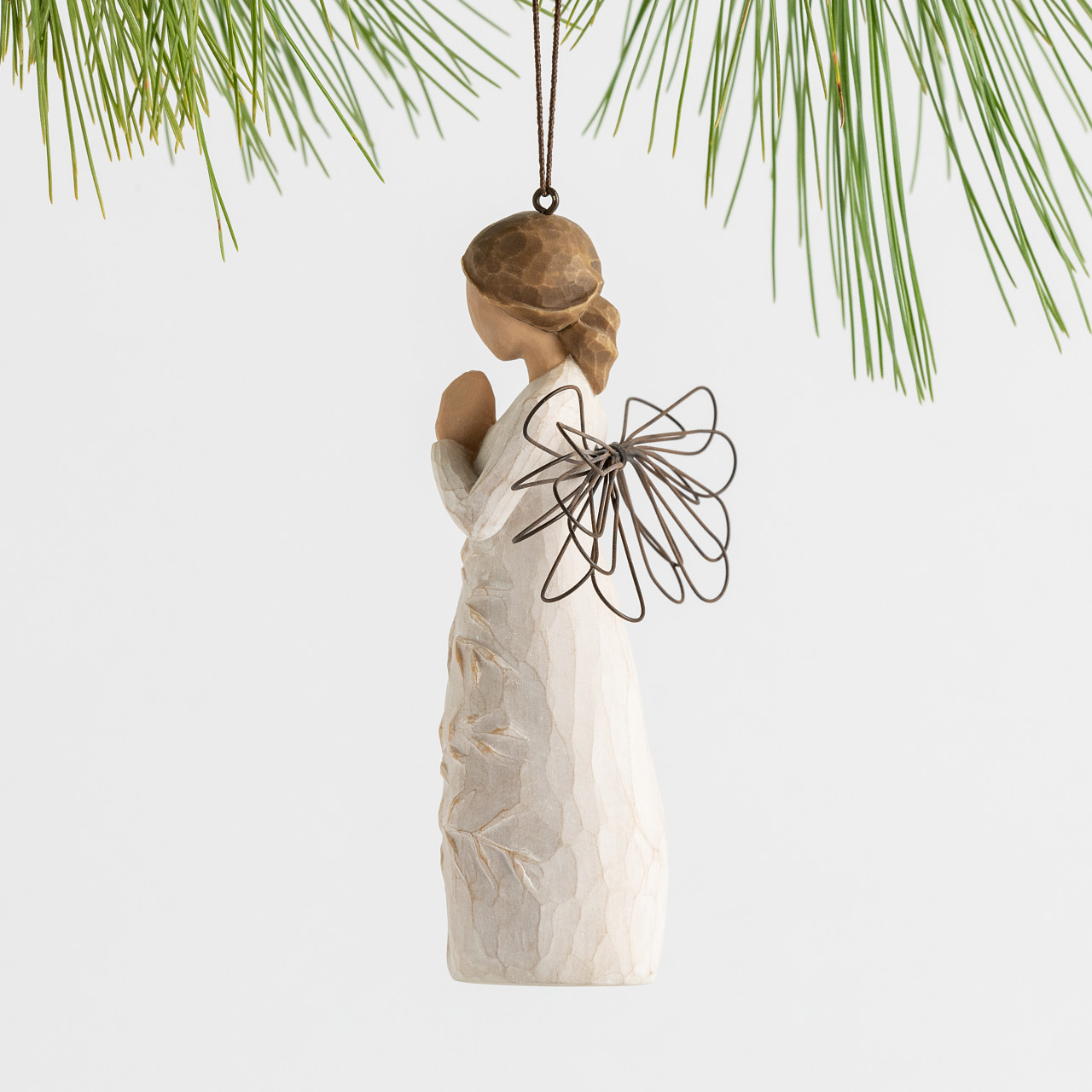 a tree, a prayer Ornament sculpted by Susan Lordi
