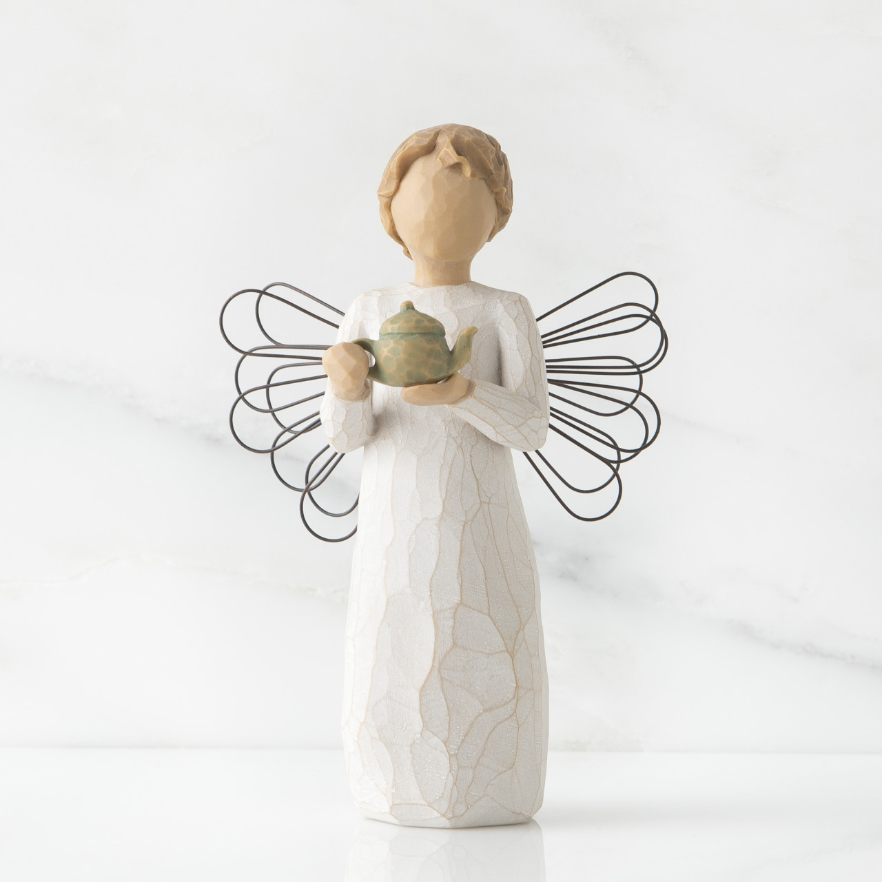 Angel of the Kitchen sculpted by Susan Lordi