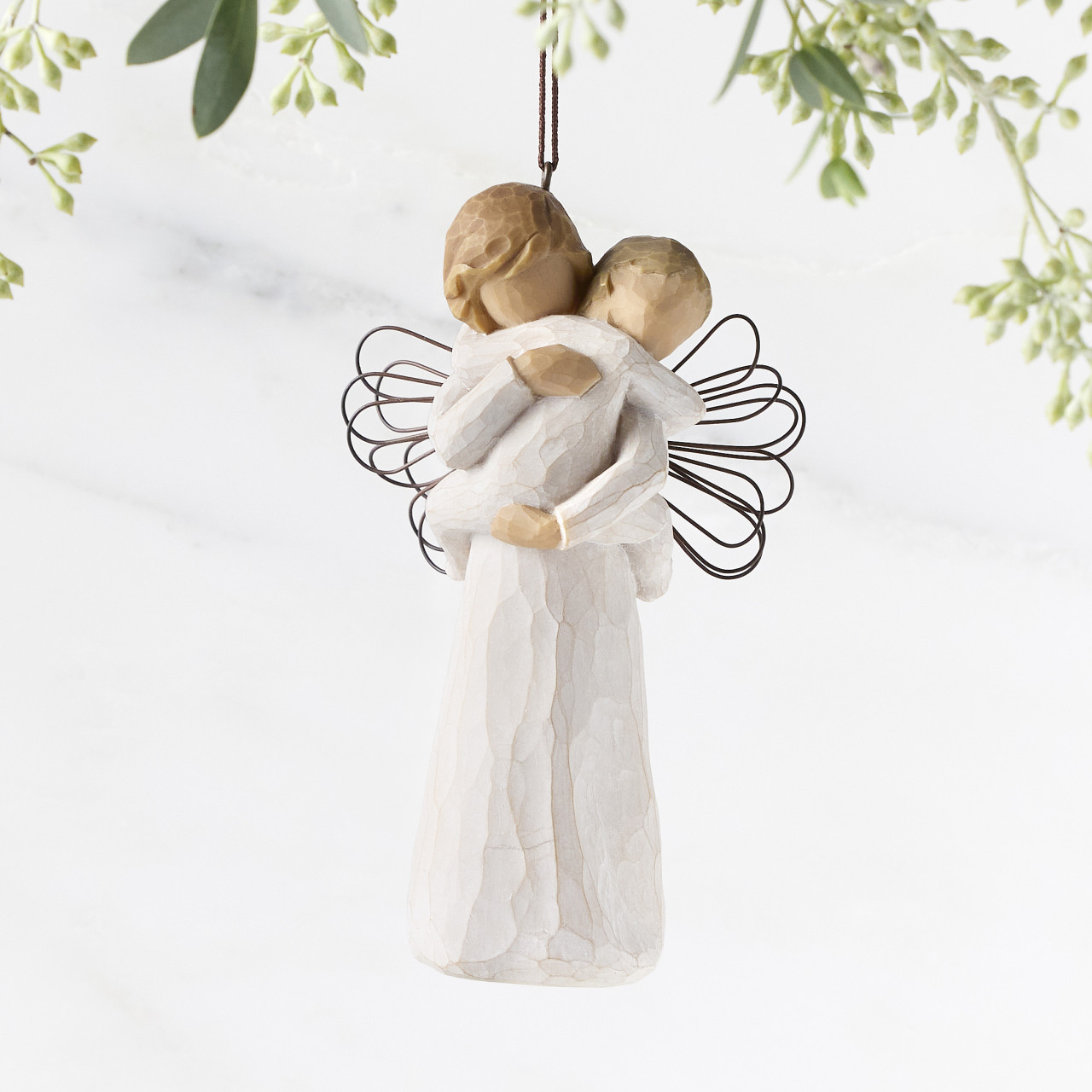 Angel's Embrace Ornament sculpted by Susan Lordi